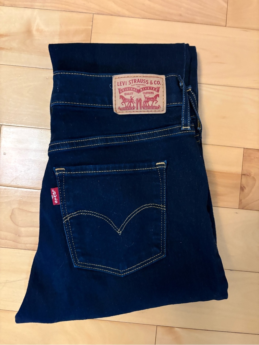 Levi's 312 Shaping Slim Jeans in Dark Indigo with Gold Stitching